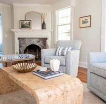 Load image into Gallery viewer, Crafted with old-world expertise, our Burl Waterfall Cocktail Table boasts a striking mid-century modern design. The elegant arc silhouette and exquisite book-matched matte burl veneer make it a unique centerpiece for a luxurious, high-style living space.