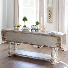 Load image into Gallery viewer, This Charlotte drop-leaf table offers great versatility due to its unique design. When folding both sides down, it transforms into a sleek sofa table. As both leaves are raised, it effortlessly becomes a convenient dining table. Its space-saving capabilities make it the perfect addition to any small area. Crafted from durable pine, this table features a charming distressed finish.