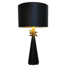 Load image into Gallery viewer, The Anemone Table Lamp features a unique design with its elegant tapered silhouette and distinctive anemone accent. The painted card cylinder shade pairs perfectly to add a touch of elegance to any room.