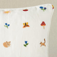 Load image into Gallery viewer, The woodland critters pillow is adorned with embroidered details and a self welt finish. With a whimsical motif featuring a variety of clever creatures, foliage, and bugs, this multi-colored pillow brings a touch of nature to your home. Includes feather/down fill insert and hidden zipper closure ensure.