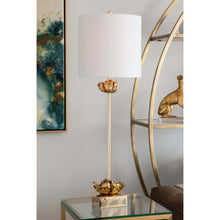 Load image into Gallery viewer, This superb piece is adorned with beautiful gold accents and finished with a classic lampshade, making it a unique and modern work of art. Delicately crafted metal flowers with a luxurious antique gold leaf finish grace the elegant and polished golden base.