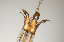 Load image into Gallery viewer, This exquisite petite chandelier features stunning hand-beaded details, candleabra bulbs, and an antique gold finish. With a dimmable light and graceful design, it is topped off with a regal touch, evocative of a crown. It's perfect for adding elegance to any room, with ornate hand-beaded accents and a shimmering antique gold finish. Enjoy the soft, adjustable lighting while appreciating the refined design.