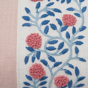 The Ashoka Rose Pillow showcases an intricate french knot design tape and a crisp, knife edge finish. The stunning, embroidered floral design is imposed on a performance linen body in a classic blush hue.