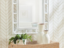 Load image into Gallery viewer, Constructed with all-natural rattan and coated in a fashionable white finish, the Bali Mirror exemplifies the essence of a relaxed coastal style. It is ideal for use in entryways, powder rooms, or foyers.
