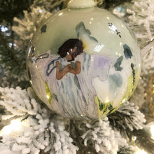 Load image into Gallery viewer, Elevate your holiday decor with Anne Neilson&#39;s exclusive, limited edition Christmas ornaments. Each one is meticulously hand-painted from an original Anne Neilson artwork, making them a unique fusion of art and festive spirit. Share these treasured ornaments with loved ones or keep them as luxurious keepsakes. Ornament is a 3&quot; glass ball with gold ribbon.
