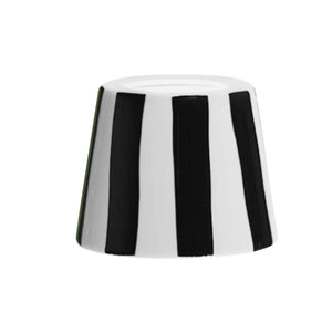 Change up your portable lamp with an easily swappable lampshade addition! Available in multiple colorways. Expertly crafted and hand-painted in Italy, this striped ceramic lampshade is available in multiple colorways to match any decor. Its unique handmade design offers a one-of-a-kind touch to elevate any living space.