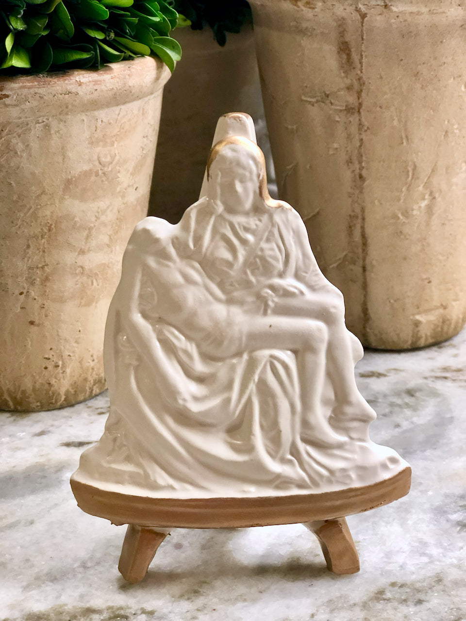 This stunning The Pieta figurine is designed to be displayed easily and elegantly. These exquisite pieces are crafted by hand and permanently mounted on ceramic easels, coated in a beautiful antique white glaze and delicately accented with gold. Create a stunning display with our iconographic easel collection, either as a group or individually.