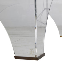 Load image into Gallery viewer, Crafted from clear acrylic, the Cindy Coffee Table boasts a sophisticated and elegant design, with a unique arched shape and brushed brass accents. Its transparency allows for an open and airy feel, complementing any space.
