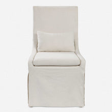 Load image into Gallery viewer, Crafted with simplicity in mind, this refined armless dining chair boasts a fitted slipcover in a neutral off-white linen blend. Its seat is cushioned for ultimate comfort and comes with an accompanying kidney pillow. The added performance treatment also makes it resistant to stains and soiling, ensuring long-lasting use.
