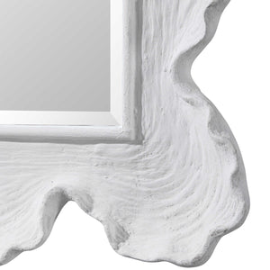 Featuring a modern coastal design, this mirror evokes the appearance of white coral. The frame is finished in matte white with a distinct texture and noticeable waves, adding an organic touch. The mirror boasts a 1" bevel and can be hung horizontally or vertically.