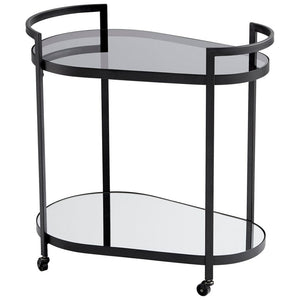 The Cosmo bar cart exudes a harmonious blend of contemporary and luxurious components. Its sleek design is inspired by geometry, featuring clean lines and oval surfaces. With a sturdy metal frame, this portable serving station boasts two levels of tempered glass. The caster lock wheels provide the perfect mobility for serving your guests on the move. Impress at your next gathering by offering your favorite drinks directly from the elegant Cosmo bar cart.