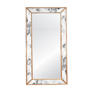 The Dion floor mirror, with its antique finish, is a must-have for adding a touch of modern glamor to any space. Its faceted frame, outlined by a delicate border of gold leaf, serves as a work of art in its own right. Whether as an elegant addition to a dressing room or a striking focal point hangs horizontally over an entryway console, Dion is the perfect choice.