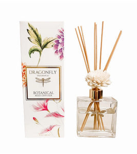 Discover the power of scent in any space with our Dragonfly Floral Reed Diffuser. Our exquisite diffusers feature a single handcrafted wood flower for optimal diffusion. The porous rattan reeds and delicate wood petals efficiently absorb and release fragrance. Please note that the appearance of each wood flower may vary slightly due to its handmade nature.