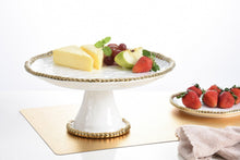 Load image into Gallery viewer, Transform your desserts into exquisite masterpieces with our elegant round cake stand. Perfect for displaying cakes, cupcakes, and pastries in a sophisticated and exclusive manner.
