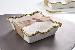 Enhance the visual appeal and sophistication of your dining area with this stunning cocktail napkin holder. Doubles as servingware to present delectable pastries and fresh fruit. Made of high-quality white porcelain with shimmering gold beads made of titanium.