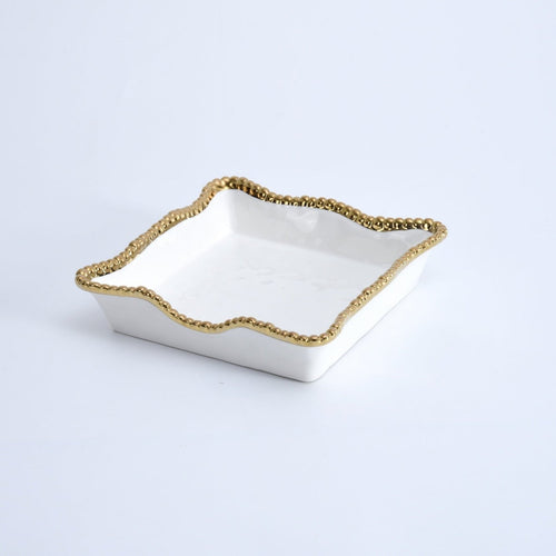 Enhance the visual appeal and sophistication of your dining area with this stunning luncheon napkin holder. Doubles as servingware to present delectable pastries and fresh fruit. Made of high-quality white porcelain with shimmering gold beads made of titanium.