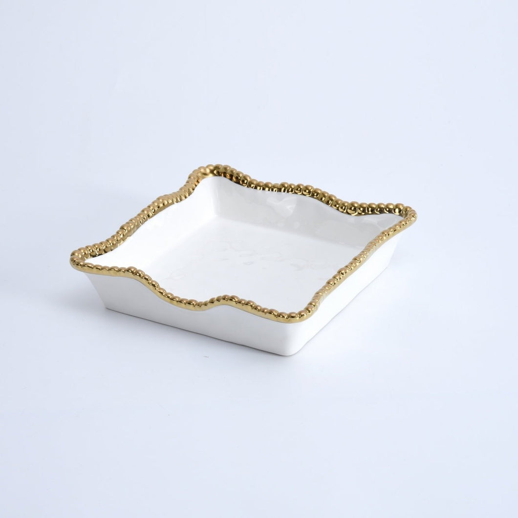 Enhance the visual appeal and sophistication of your dining area with this stunning luncheon napkin holder. Doubles as servingware to present delectable pastries and fresh fruit. Made of high-quality white porcelain with shimmering gold beads made of titanium.