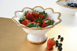 This flower-shaped footed bowl is a true statement piece that can be used as a centerpiece, fruit bowl, or snack bowl.