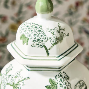Brighten up your place with the stunningly beautiful Hand-Painted Green and White Temple Jar. This 14" chinoiserie work of art brings a touch of class to any space. Each jar is hand-crafted and hand-painted, making it a truly unique and sophisticated addition to your home decor.