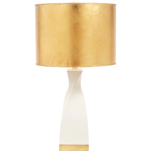With a gold leaf cylinder shade and intricate white gesso finish, this lamp will truly illuminate any space from the inside out!