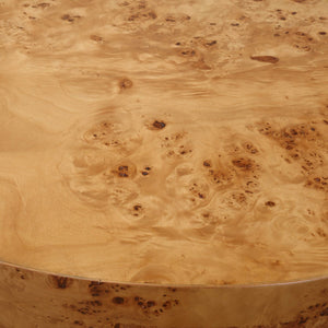 Burl is highly valued for its distinct grain pattern and complex designs. The Honey Burl coffee table is adorned with poplar burl veneer, adding a natural and inviting touch to any space. Its honey tone is gently enhanced with a satin finish, creating a warm and appealing aesthetic.