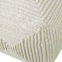 Load image into Gallery viewer, Crafted with 100% wool, this pouf features a soft ivory color and geometric accents. The oversized design makes it ideal for use as a footrest or extra seating, providing both comfort and style to any living space.
