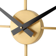 Load image into Gallery viewer, The Kianne Timepiece is crafted from durable stainless steel and plated with brushed brass. Bold contrast is achieved with matte black hands, allowing for effortless readability while making a stylish statement. With quartz movement, this clock guarantees precise timekeeping.
