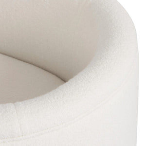 The Lansky barrel chair is expertly crafted with a luxurious white boucle fabric, elevating any space with its touch of sophistication and warmth. With a three leg design, this chair offers both style and practicality, making it a perfect choice for smaller rooms or apartments. Discover the ultimate combination of comfort and functionality with the Lansky.