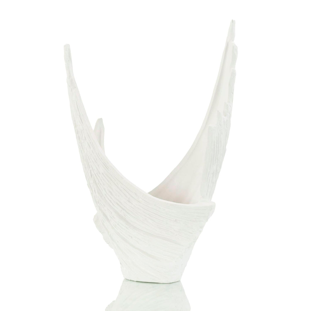 Experience the elegance of our winged vase, with a beautiful silhouette and a sense of flowing motion. Made of white porcelain, the vase is adorned with intricate textural designs and two graceful wings intertwined for a mesmerizing, spiraling effect.