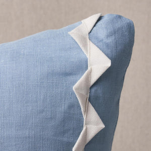 Experience the unique three-dimensional stripe of Lazare in ivory-on-chambray with this pillow. Using a knife edge finish and sewing the grosgrain ribbon into zigzag bands, this pillow adds a sophisticated touch to any space. Crafted from linen-blend ground fabric, Lazare is the perfect addition to your home decor.