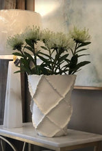 Load image into Gallery viewer, Create a sophisticated and elegant display in any room with the Leila White Gesso Vase. Its tall stature, combined with a matte gesso finish and intricate criss cross ridge detail, make it a must-have piece for any stylish home.
