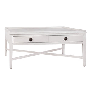This versatile cross-base coffee table features four beveled drawers, providing ample storage space while keeping sightlines clean and organized.