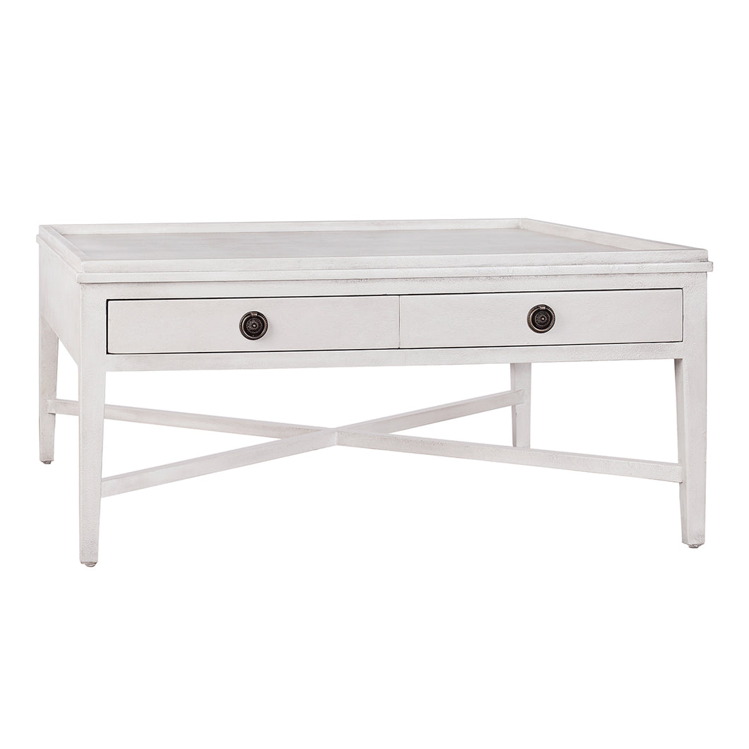 This versatile cross-base coffee table features four beveled drawers, providing ample storage space while keeping sightlines clean and organized.