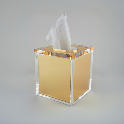 The smooth and transparent lucite exterior of this tissue box is complemented by an inner lining of shining gold, adding a touch of glamour to any room.