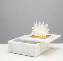 Load image into Gallery viewer, This elegant marble jewelry box is expertly hand-crafted, adding a touch of sophistication to any dressing table. Featuring a cluster of natural Brazilian clear quartz points, it serves as both a luxurious storage option and incorporates the healing and energizing qualities of quartz into your jewelry collection.
