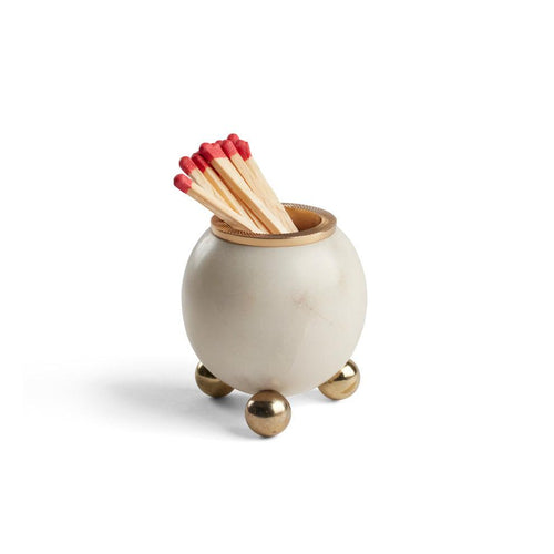 This petite match holder is made of spherical honed anthracite marble with an interior knurled natural brass finish, perfect for igniting and holding matches.