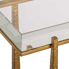 Load image into Gallery viewer, Experience true luxury with the exquisite Midas Accent Table. Crafted with textured antique gold finish iron legs, this table expertly supports a thick crystal top for an elegant touch to any room.
