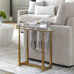 Experience true luxury with the exquisite Midas Accent Table. Crafted with textured antique gold finish iron legs, this table expertly supports a thick crystal top for an elegant touch to any room.