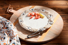 Load image into Gallery viewer, Add a touch of glamour to your next seafood soirée with this stoneware platter set that includes stainless steel oyster tongs. Each platter features a layered stoneware oyster shell rim accented with gilding that adds a unique and playful touch to your presentation. Get ready to shuck and serve in style!
