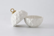 Load image into Gallery viewer, Great for serving candies, nuts, fruit, or condiments! A festive ornament shaped bowl in stunning and elegant white and gold metallic finished high-fired porcelain. Ideal for serving a variety of treats such as candies, nuts, fruits, or condiments. Made from high-fired porcelain, this stunning and elegant white and gold metallic ornament bowl is a festive addition to any table setting.
