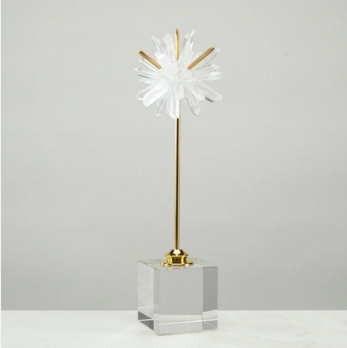 Introduce a touch of elegance to your home decor with our Quartz Cluster Star. With the base crafted from a unique combination of brass and acrylic, this sculpture is a must-have for any expert home decorator. With its versatile design, it is suitable for both modern and traditional settings, making it a perfect addition to any space.