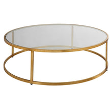 Load image into Gallery viewer, The Radius Coffee Table is an ideal addition to contemporary settings, showcasing a durable iron frame with a subtle antique gold finish. Its sleek, clear glass tabletop adds a touch of elegance to any room.
