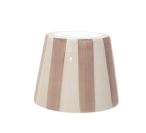 Change up your portable lamp with an easily swappable lampshade addition! Available in multiple colorways. Expertly crafted and hand-painted in Italy, this striped ceramic lampshade is available in multiple colorways to match any decor. Its unique handmade design offers a one-of-a-kind touch to elevate any living space.