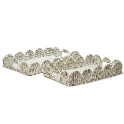 Crafted to seamlessly blend style and functionality, these trays are designed to enhance your dining and entertaining experiences, whether indoors or outdoors. Made from durable all-weather wicker, these trays boast a timeless aesthetic that complements any setting. Serve your favorite dishes, drinks, or appetizers with confidence, knowing that these trays are built to withstand the elements and stand the test of time.