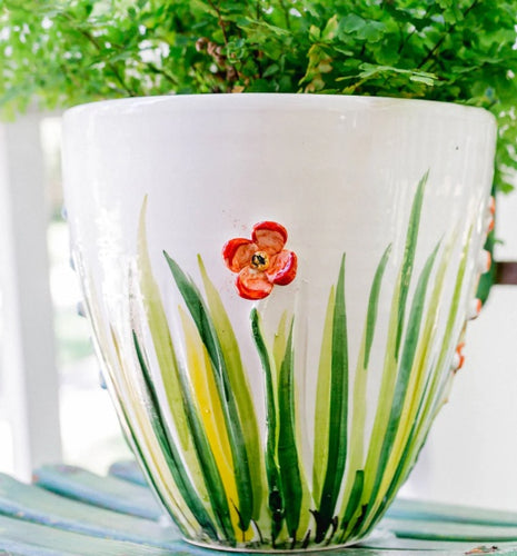 Show off your green thumb in style with this Italian-made cachepot featuring delicate hand-painted flowers in charming bright hues. A beautiful addition to any indoor or outdoor space.