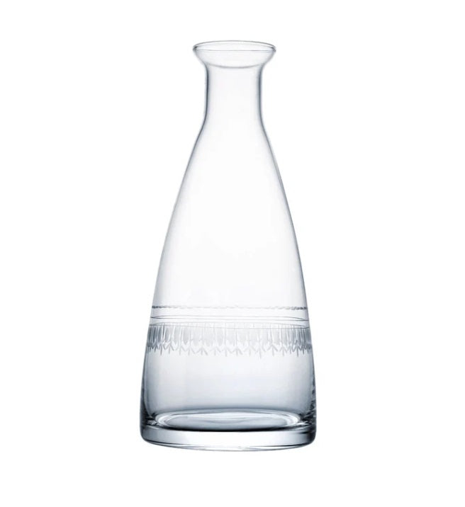 A versatile table carafe, well-suited for water or wine. Made from elegant lead-free crystal, hand-blown and hand-cut to perfection. These glasses are not only visually stunning, but also dishwasher safe for convenient cleaning.