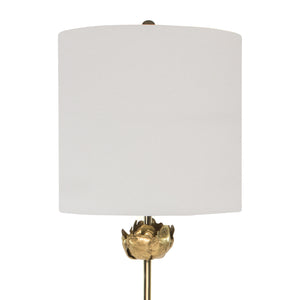 This superb piece is adorned with beautiful gold accents and finished with a classic lampshade, making it a unique and modern work of art. Delicately crafted metal flowers with a luxurious antique gold leaf finish grace the elegant and polished golden base.