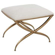 Load image into Gallery viewer, Crafted with a timeless and sophisticated design, this compact bench boasts a gracefully curved iron frame coated in a luxurious gold leaf finish. The padded seat, covered in a pristine white fabric, offers both a cozy spot to sit and a place to prop up your feet.
