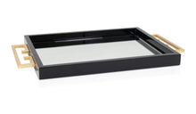 Load image into Gallery viewer, The Avana Tray features a high gloss lacquer finish in black or white, accompanied by a beveled mirror inset and gold leaf iron handles on the sides, making it both decorative and functional.
