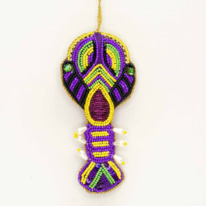 Celebrate Carnival Season with this beaded ornament featuring two of our favorite things - Mardi Gras and crawfish! Don't miss this quirky and fun addition to your holiday decor.